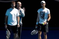 FILE - In this Jan. 14, 2018, file photo, Serbia's Novak Djokovic, right, talks with his coache ...