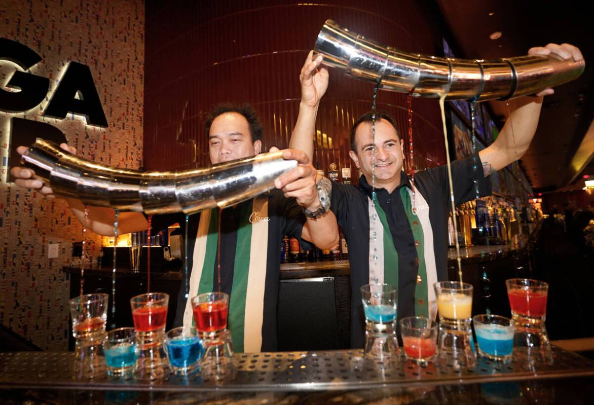 Flair bartenders Spyder Rigor, left, and Vache Manoukian show their skills, Friday, Sept. 2, 20 ...