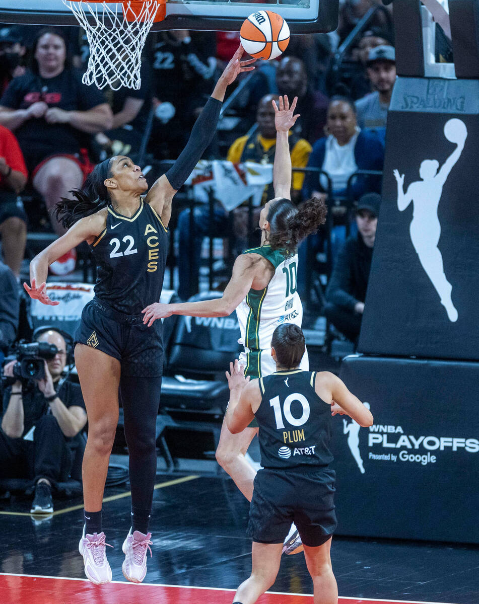 Las Vegas Aces forward A'ja Wilson (22) blocks a shot by Seattle Storm guard Sue Bird (10) duri ...