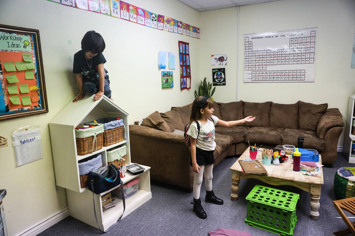 Elliotte Campbell, 10, leads a tour on Aug. 31, 2022, of Bloom Academy, a "self-directed learni ...