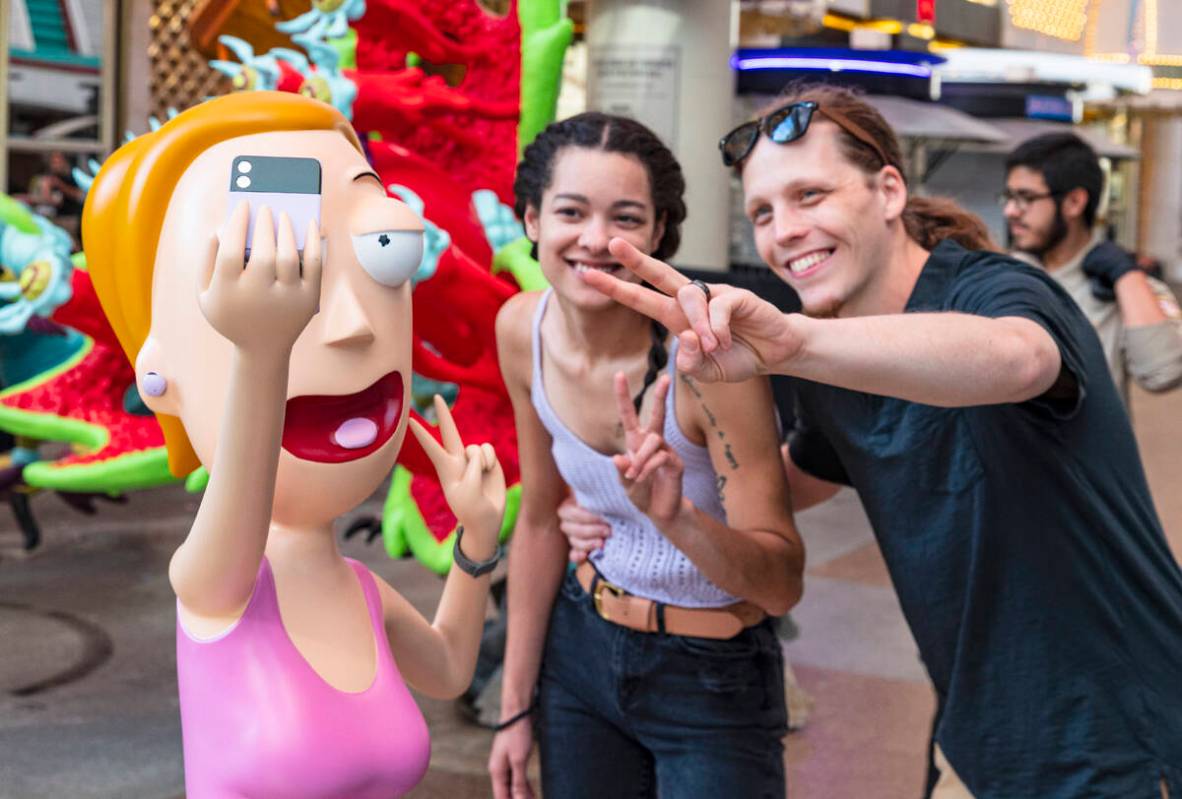 Taylor Smith and her husband Jake pose for a selfie with Summer Smith, one of the three charact ...