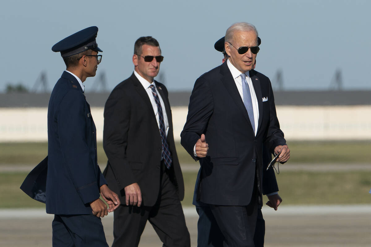 President Joe Biden walks on the tarmac to board Air Force One at Andrews Air Force Base, Md., ...