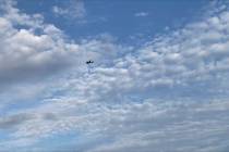 A small airplane circles over Tupelo, Miss., on Saturday, Sept. 3, 2022. Police say the pilot ...