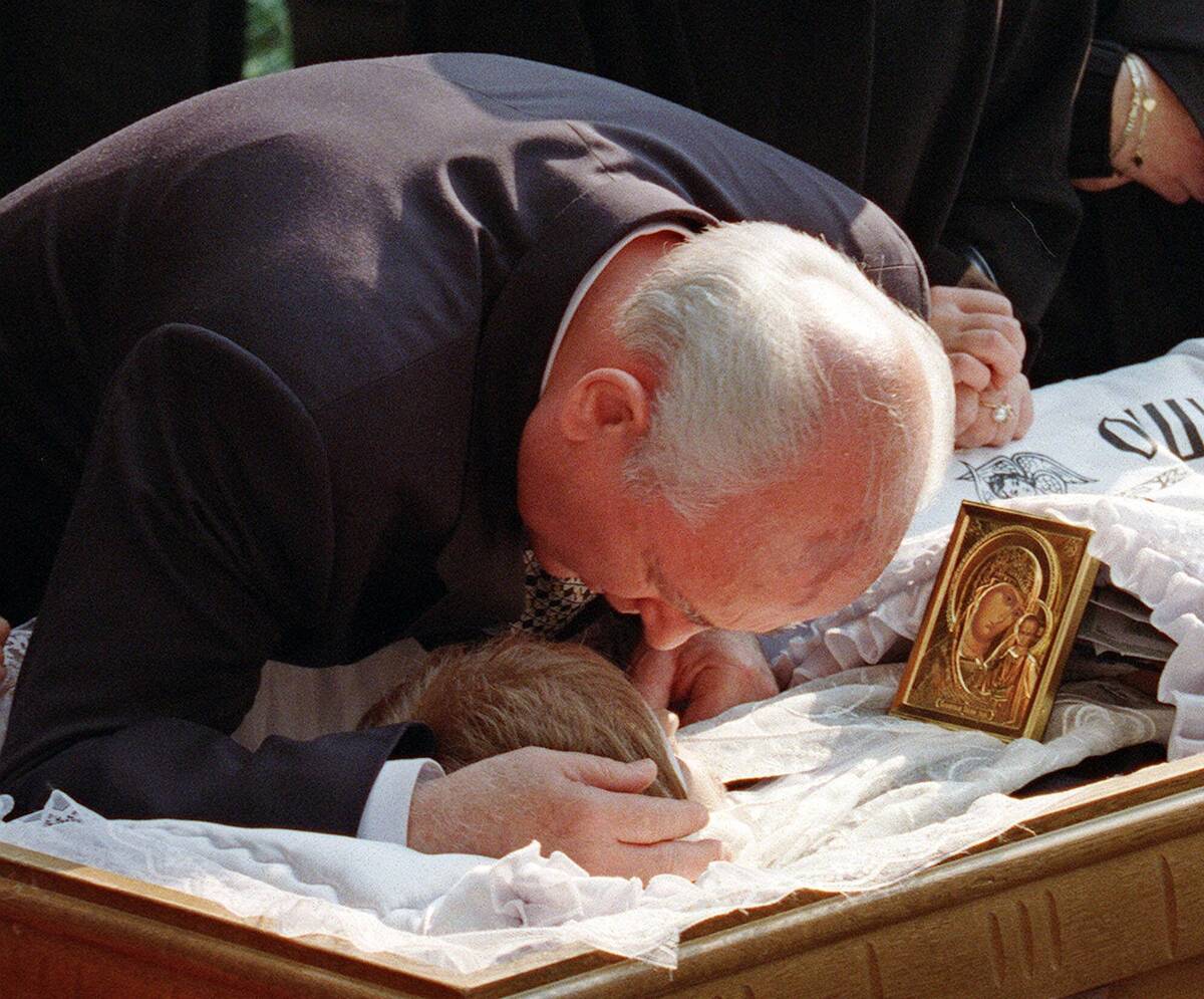 FILE - Former Soviet President Mikhail Gorbachev bids a final farewell to his wife Raisa just m ...
