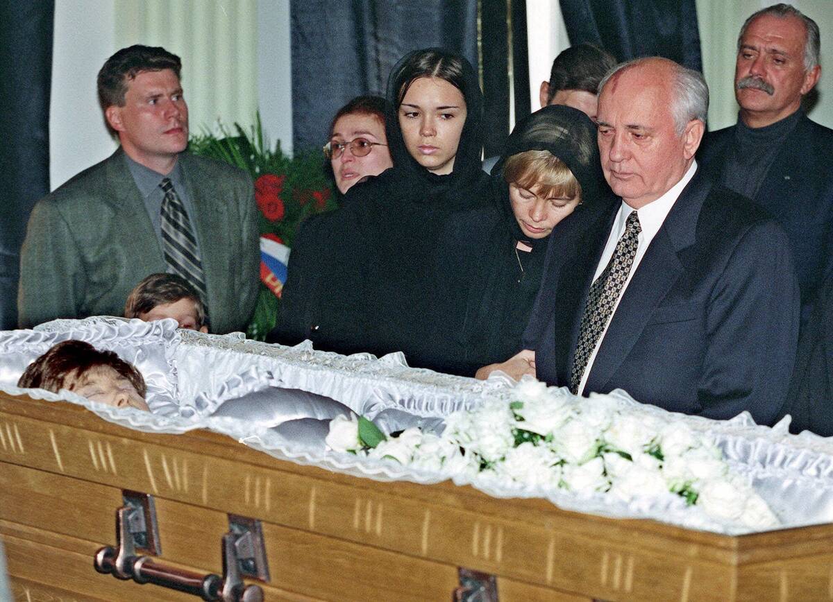 FILE - Former Soviet President Mikhail Gorbachev stands with daughter Irina and granddaughter K ...