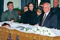 FILE - Former Soviet President Mikhail Gorbachev stands with daughter Irina and granddaughter K ...