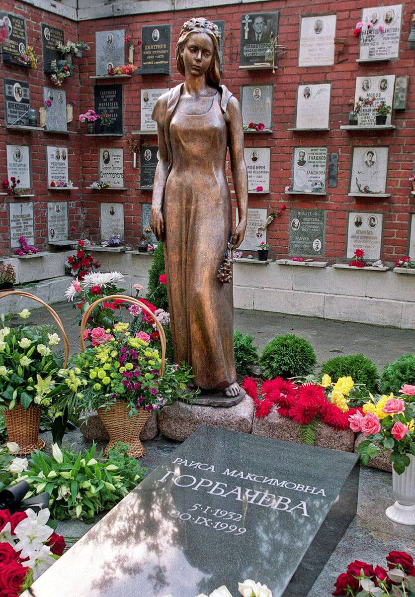 FILE - A monument to Raisa Gorbachev, wife former Soviet President Mikhail Gorbachev stands beh ...