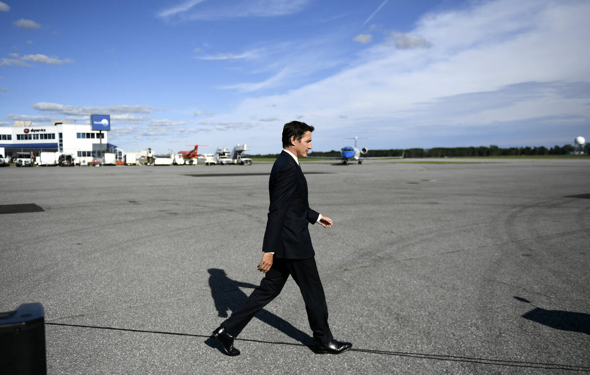 Canadian Prime Minister Justin Trudeau arrives in Ottawa, Ontario, to make a statement about th ...