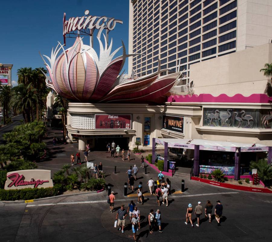 Pedestrians walk the Strip on Labor Day, Monday, Sept. 5, 2022, in Las Vegas. (Steel Brooks/Las ...