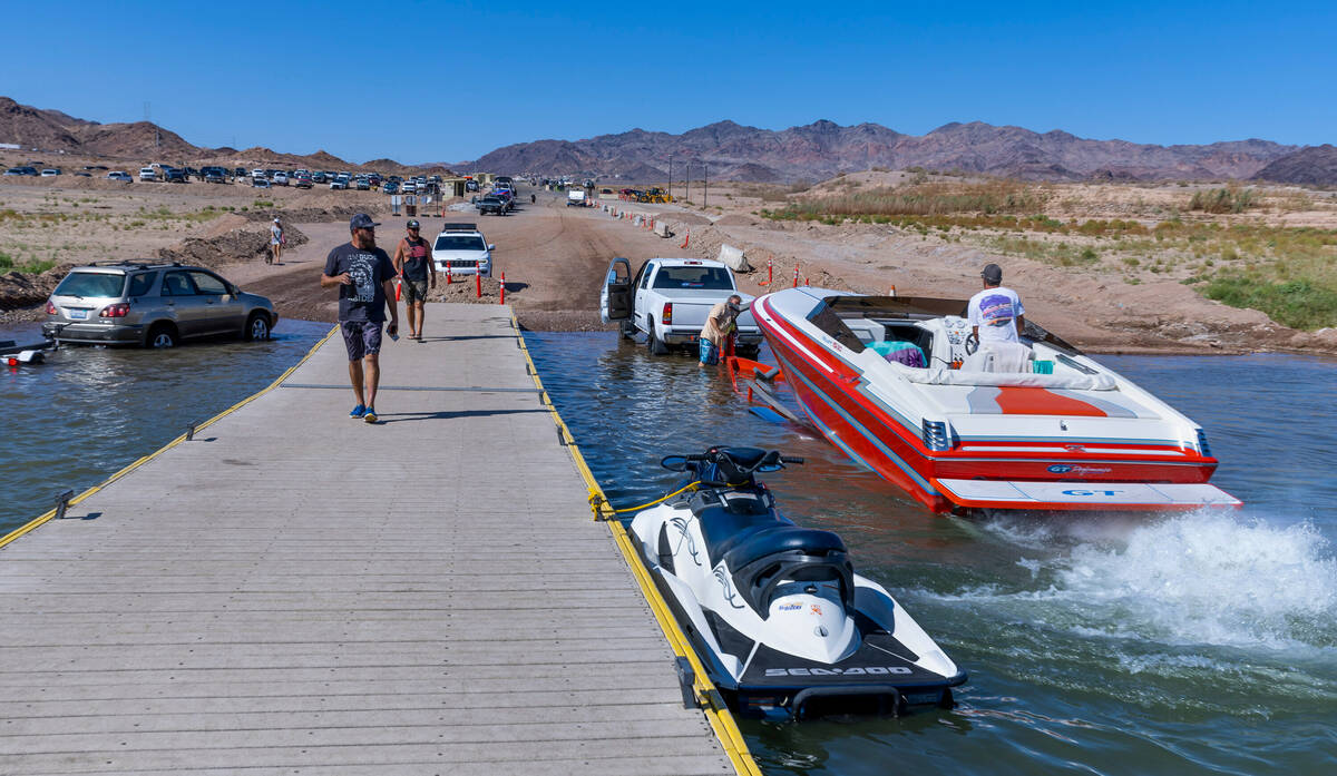 Boats launch and are taken out at Hemenway Harbor with an average half hour wait time on Labor ...