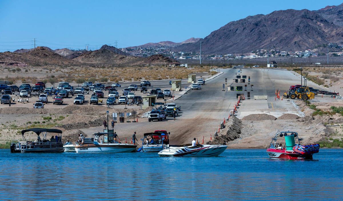 Boats line up to launch and be taken out at Hemenway Harbor with a short wait time on Labor Day ...