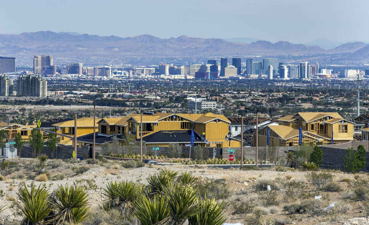 New homes under construction in Las Vegas' Summerlin community on Wednesday, March 30, 2022. (L ...