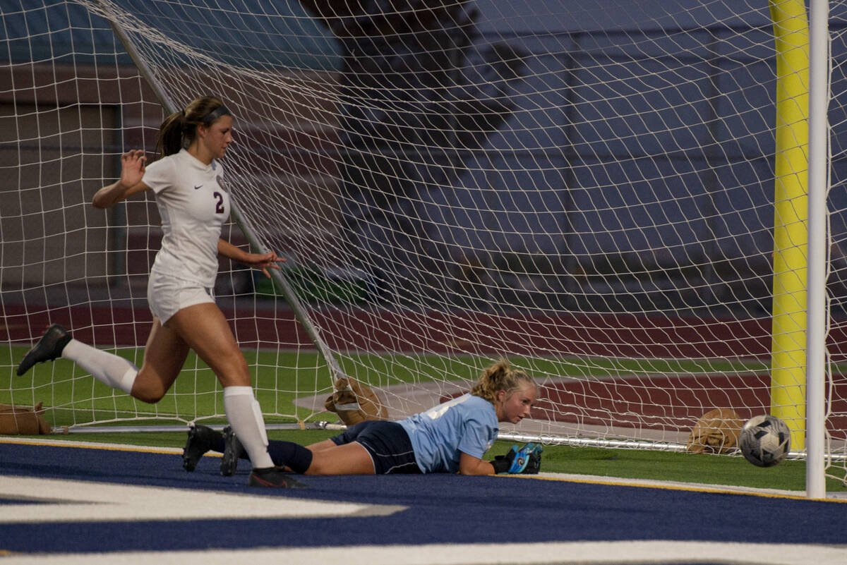 Centennial High School goalie Ellie Church (18) watches the ball go in as Desert Oasis scores a ...