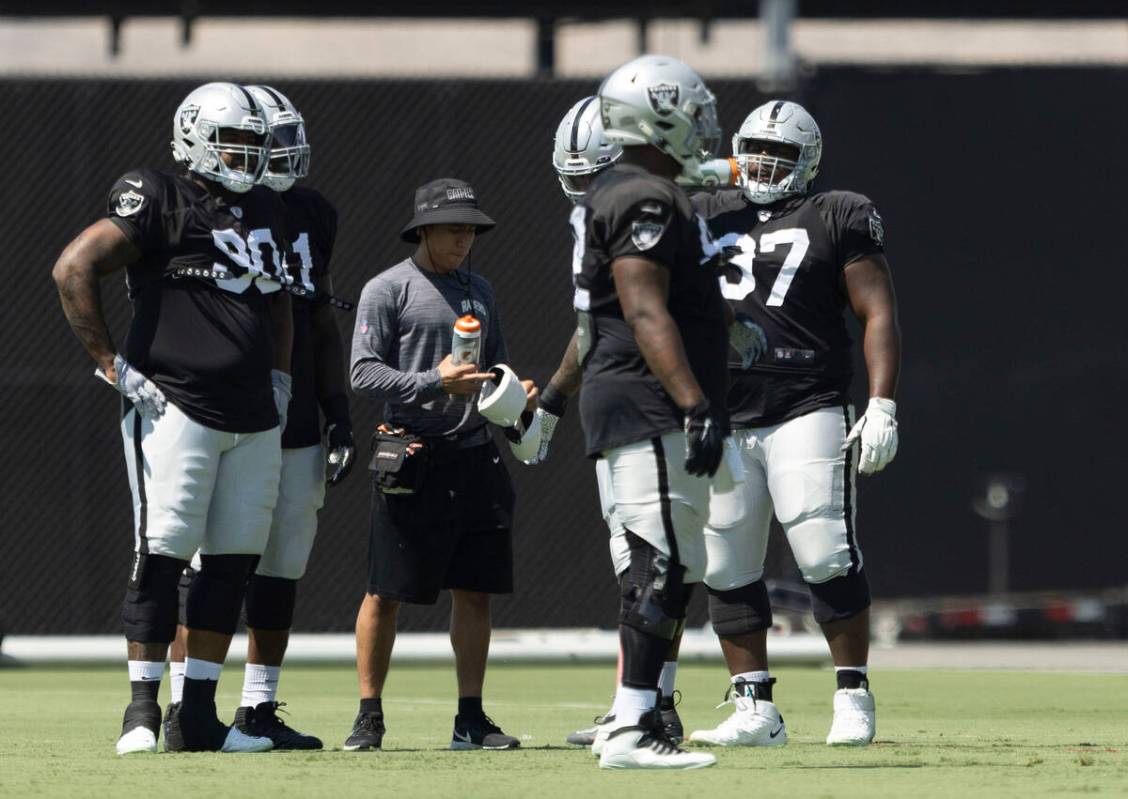 Raiders defensive tackles Johnathan Hankins (90), Bilal Nichols (91), Neil Farrell Jr. (92) and ...