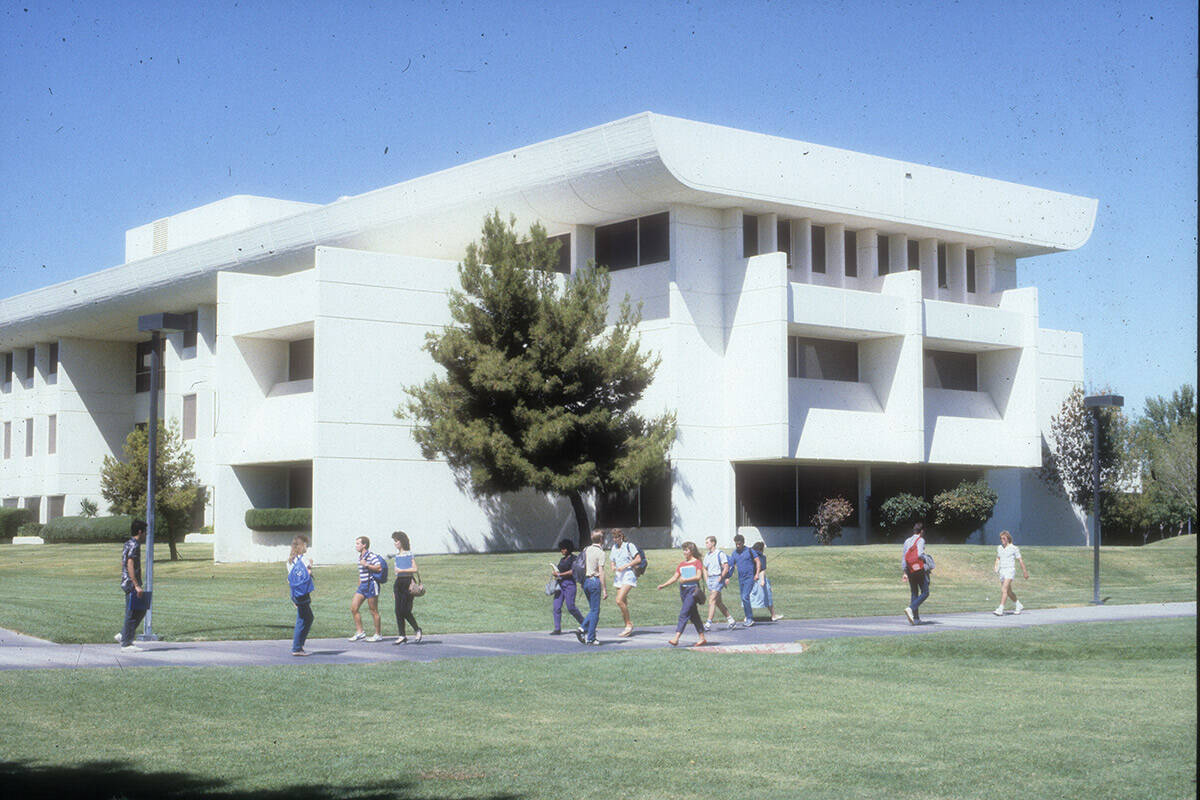Students walking outside of the William D. Carlson Education Building in 1985 at the University ...