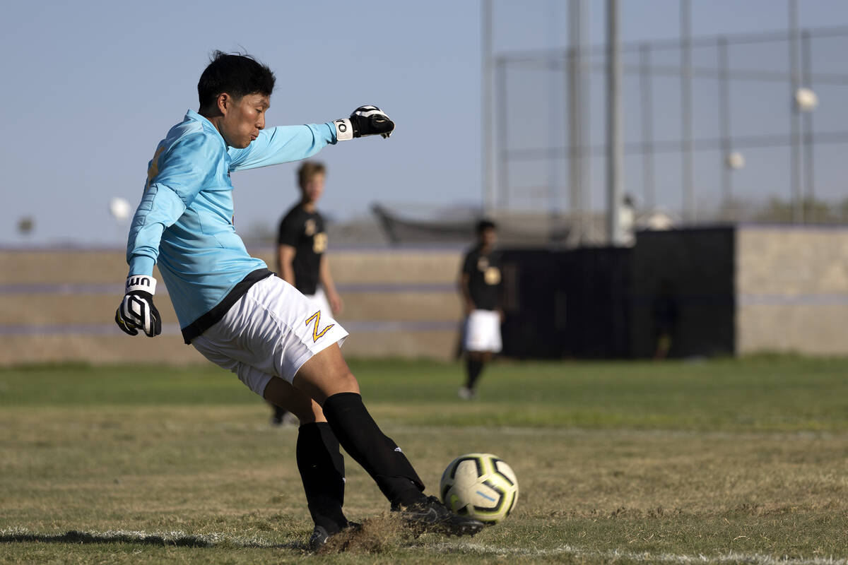 Durango goaltender Joshua Wong kicks the ball into play during a high school soccer game agains ...