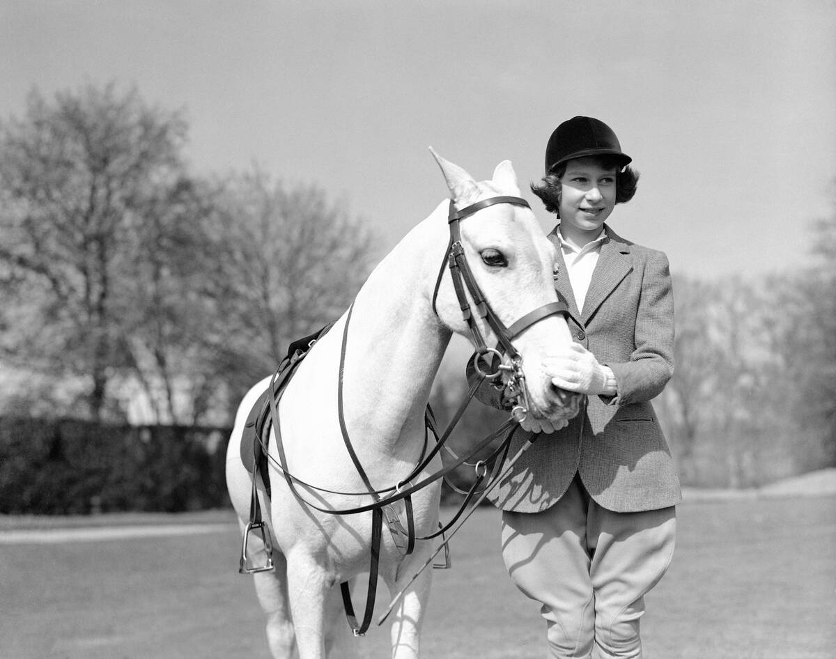 Princess Elizabeth the eldest daughter of King George VI and Queen Elizabeth, poses for a photo ...