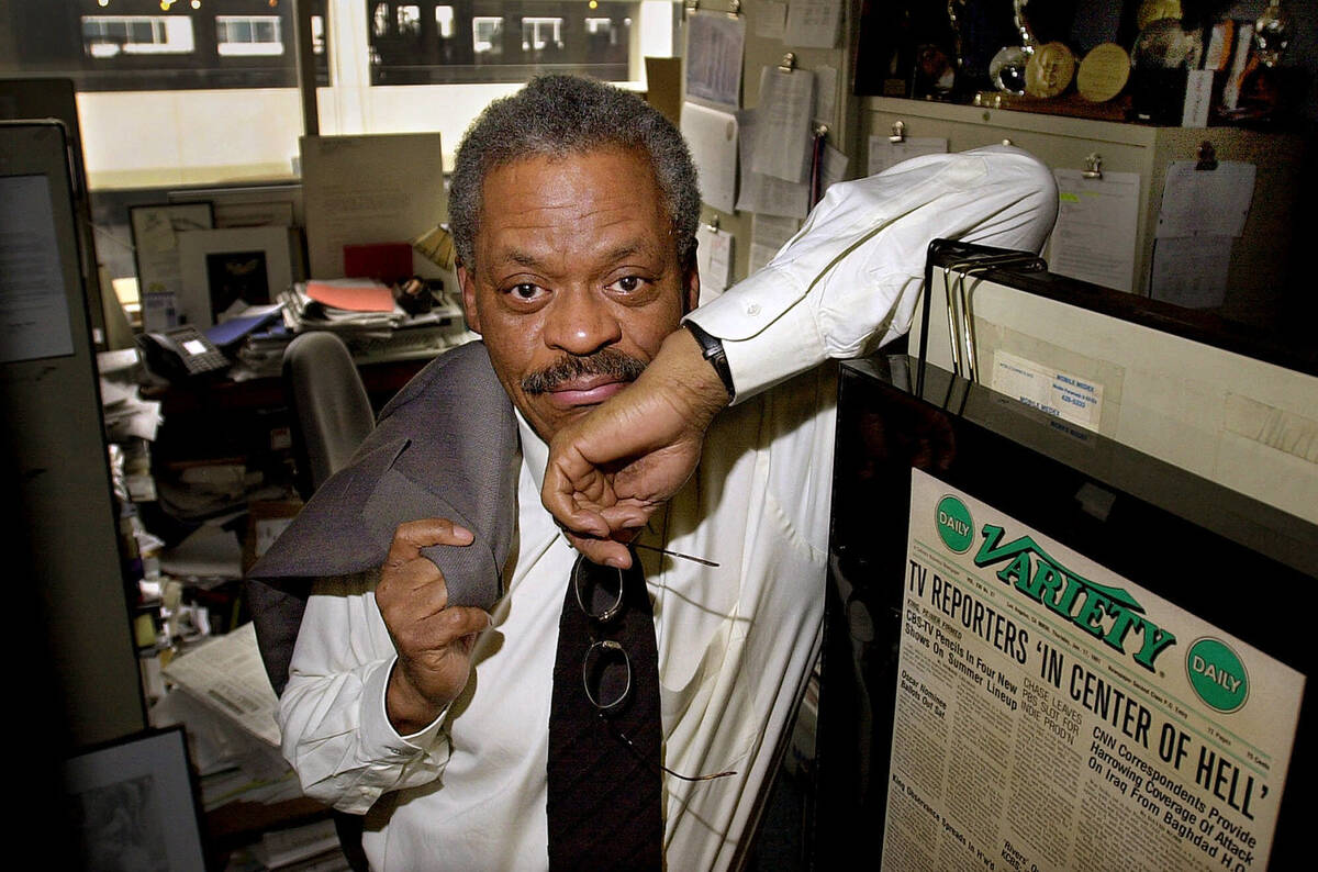 FILE - CNN anchor Bernard Shaw poses in his office at CNN's Washington bureau on Feb. 15, 2001. ...