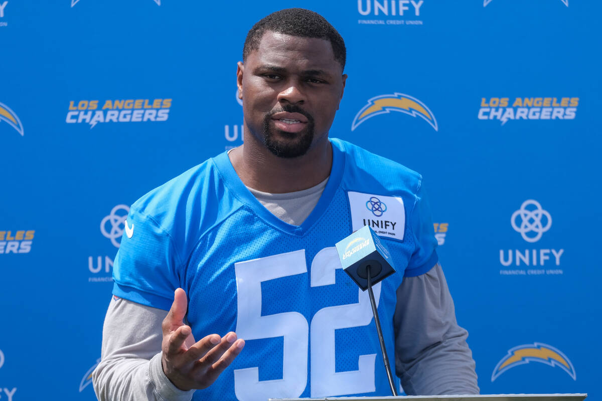 Los Angeles Chargers outside linebacker Khalil Mack (52) answers questions during a news confer ...