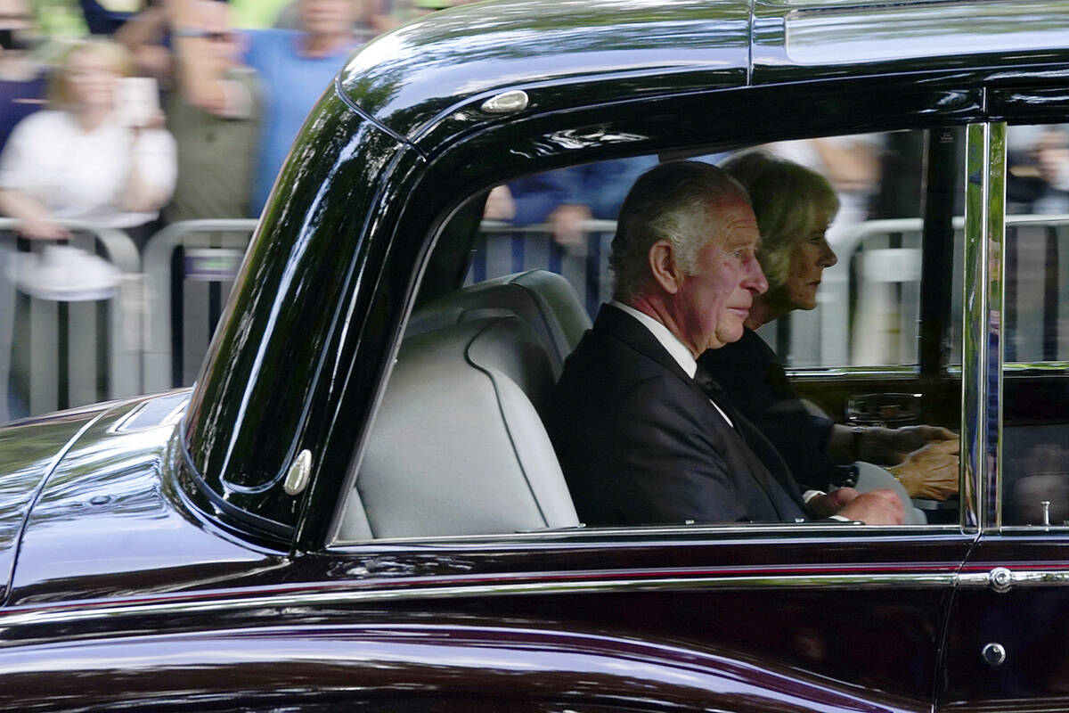 Britain's King Charles III and Camilla, the Queen Consort, arrive at Buckingham Palace after tr ...