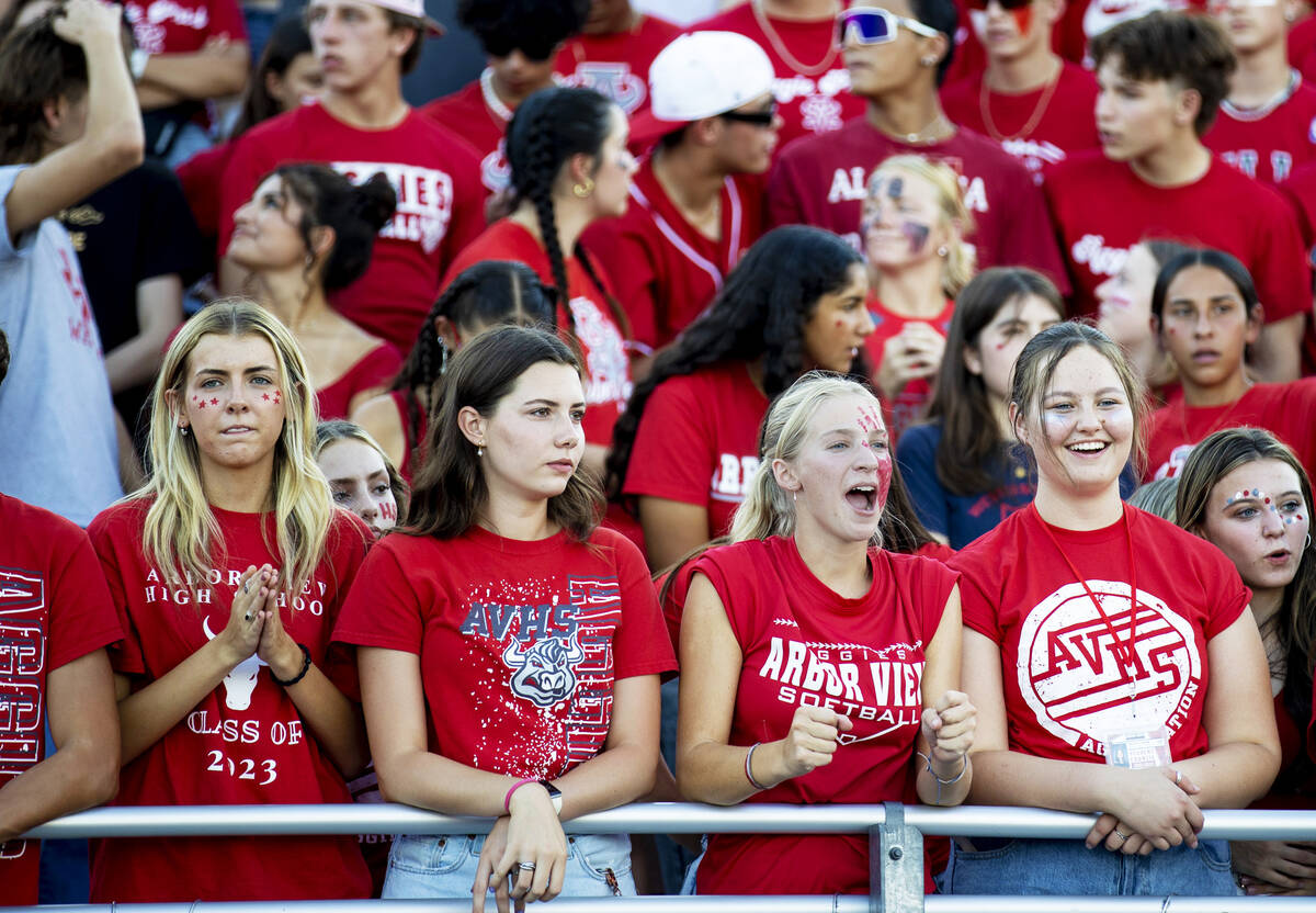 FILE - Arbor View High School students watch and cheer as Arbor View hosts Snow Canyon for the ...