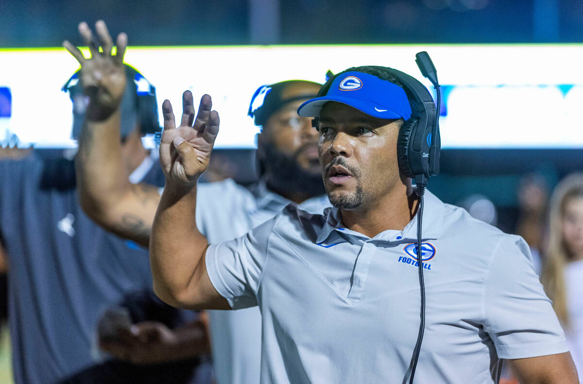 Bishop Gorman head coach Brent Browner signals the 4th quarter versus Hamilton during the secon ...