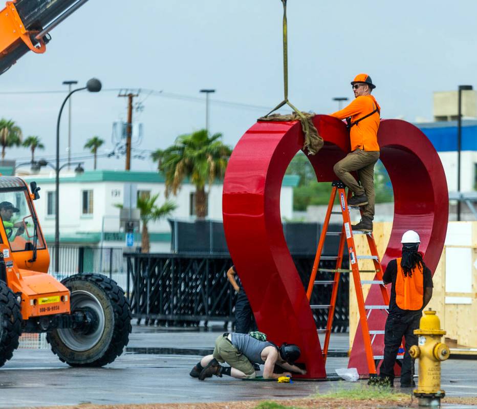 A crew erects a giant heart at the Llama Lot as set up production continues for the upcoming Li ...