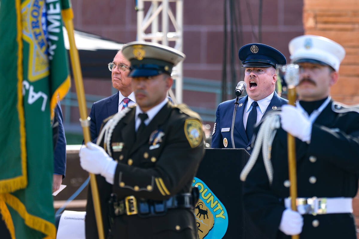 TSgt. Ben Ekblad sings the national anthem at the 9/11 memorial ceremony at the Clark County Go ...