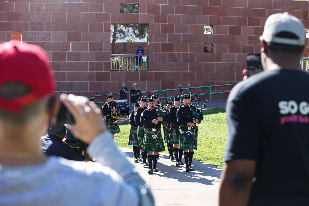 The Las Vegas Emerald Society approaches the stage at the 9/11 memorial ceremony at the Clark C ...