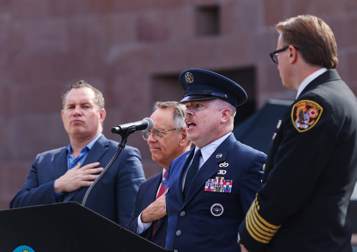 TSgt. Ben Ekblad sings the national anthem at the 9/11 memorial ceremony at the Clark County Go ...