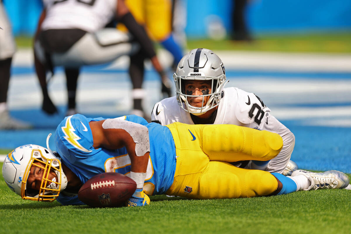 Raiders safety Johnathan Abram (24) tackles Los Angeles Chargers fullback Zander Horvath (40) d ...