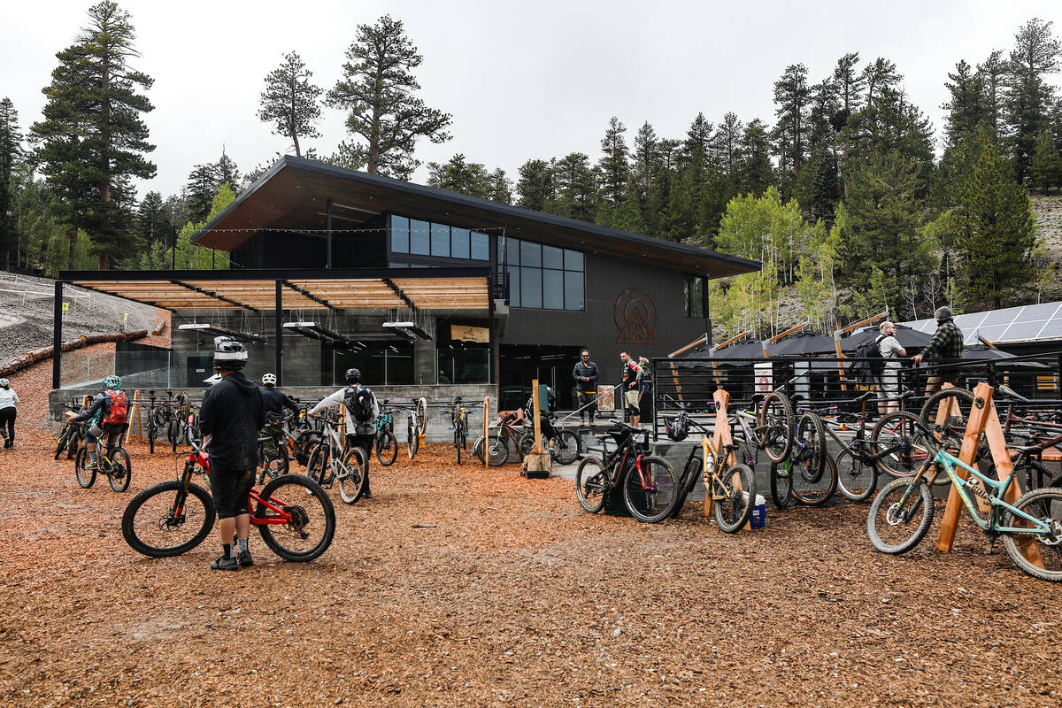 Bicyclists hang out near the restaurant and downhill mountain bike park at Lee Canyon resort in ...