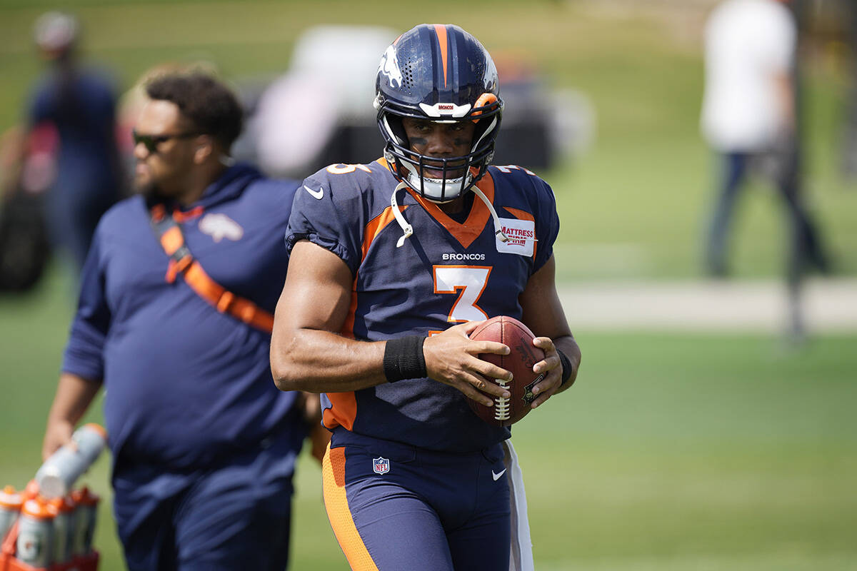 Denver Broncos quarterback Russell Wilson pauses during NFL football practice Thursday, Sept. 8 ...