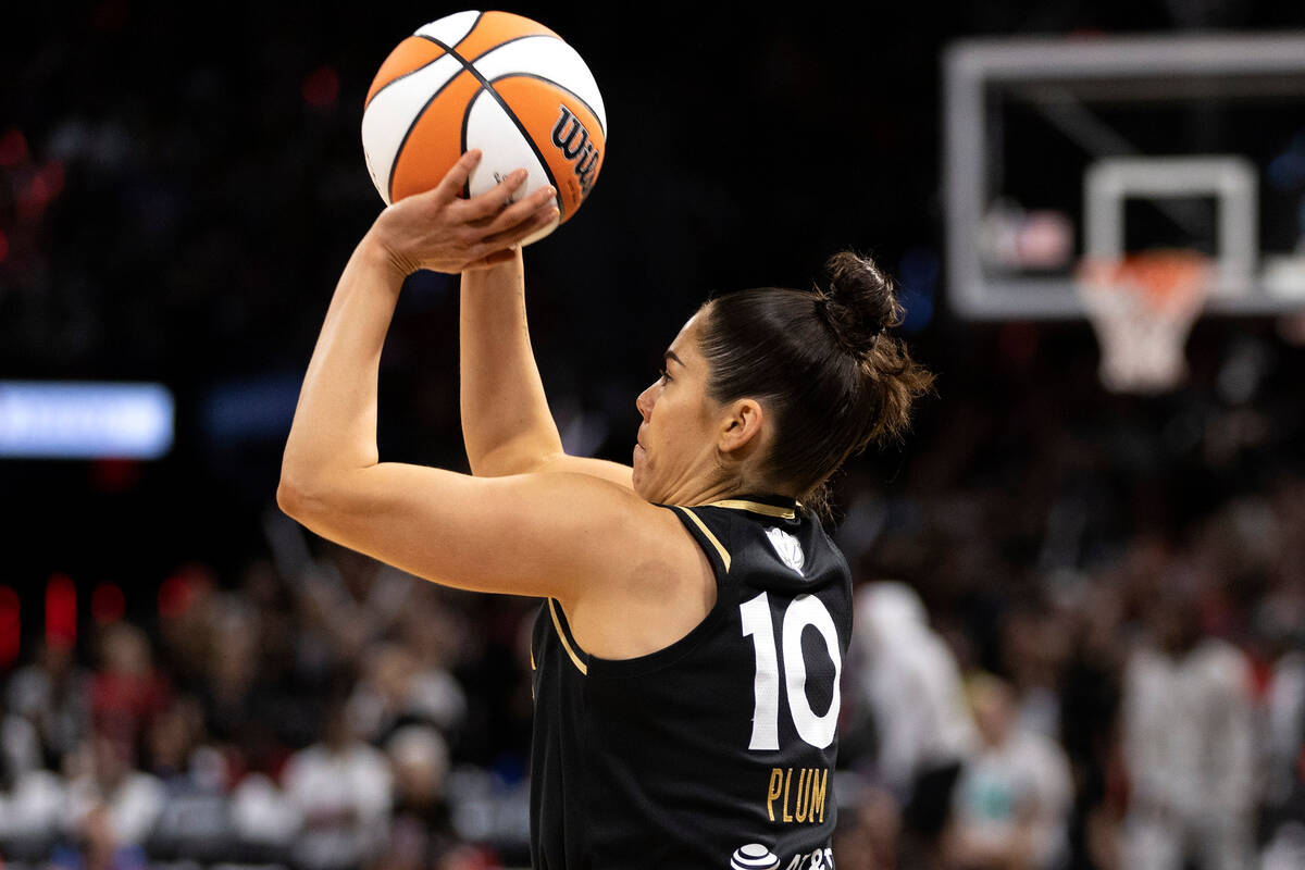 Las Vegas Aces guard Kelsey Plum (10) shoots a 3-point shot during the second half in Game 1 of ...