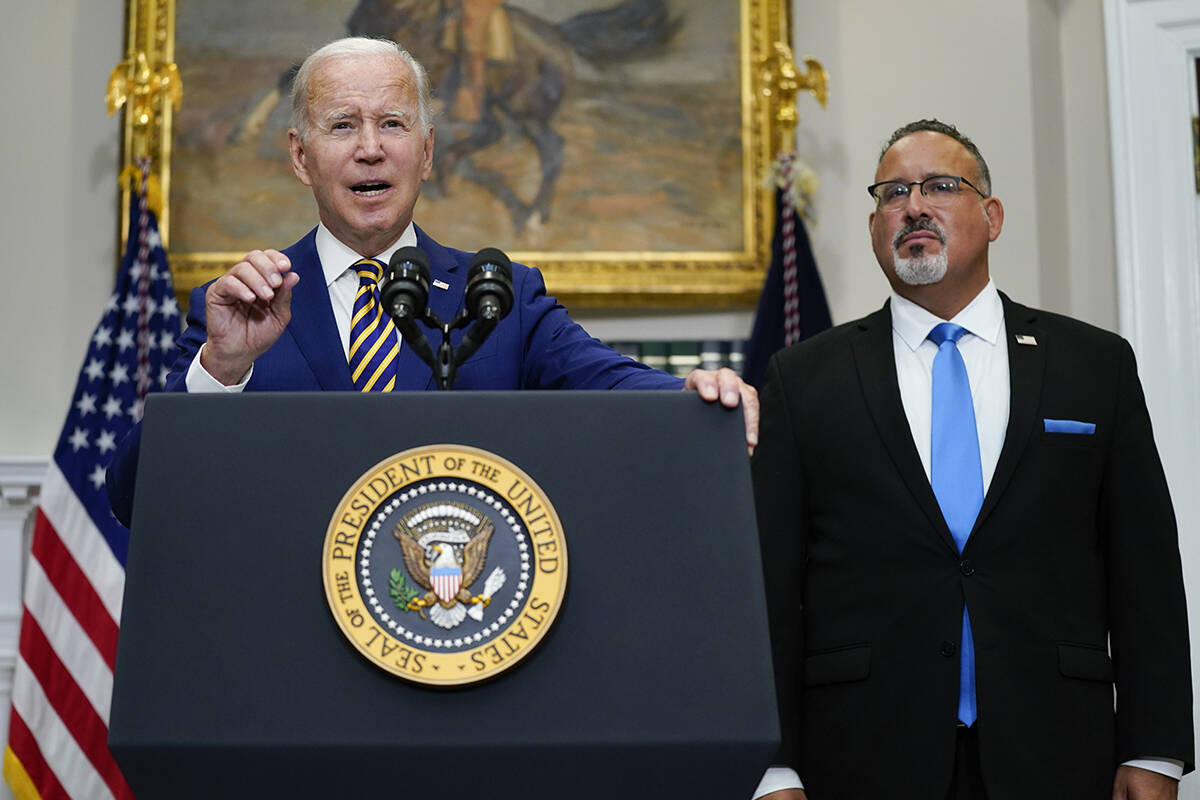 President Joe Biden speaks about student loan debt forgiveness in the Roosevelt Room of the Whi ...
