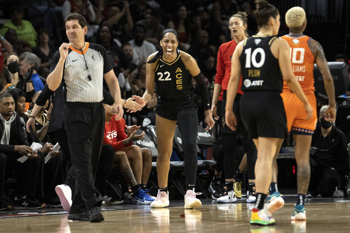 Las Vegas Aces forward A'ja Wilson (22) celebrates after a foul is called on the Connecticut Su ...