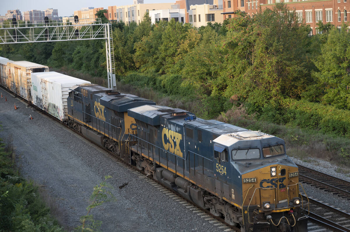 A CSX freight train travels through Alexandria, Va. on Thursday, Sept. 15, 2022. President Joe ...