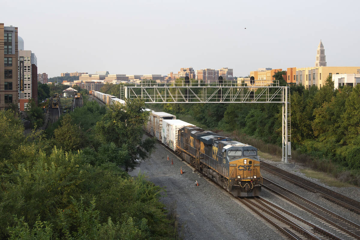 A CSX freight train travels through Alexandria, Va. on Thursday, Sept. 15, 2022. President Joe ...