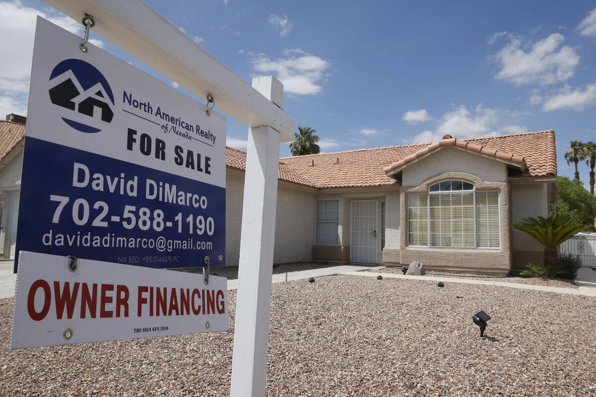 A sales sign is seen at 5251 Misty Morning Drive, Friday, Aug. 5, 2022, in Las Vegas. (Chitose ...