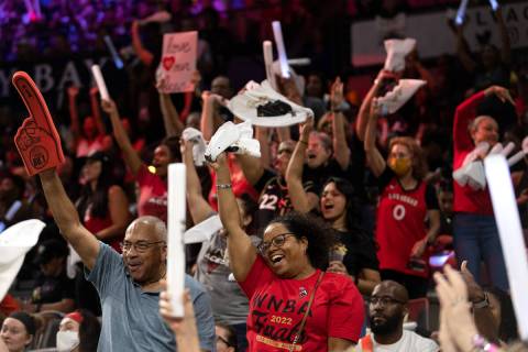 Las Vegas Aces fans cheer for their team during the second half in Game 1 of a WNBA basketball ...