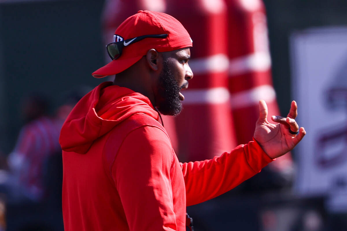 UNLV Rebels defensive coordinator Keith Heyward motions to his players during the first day of ...