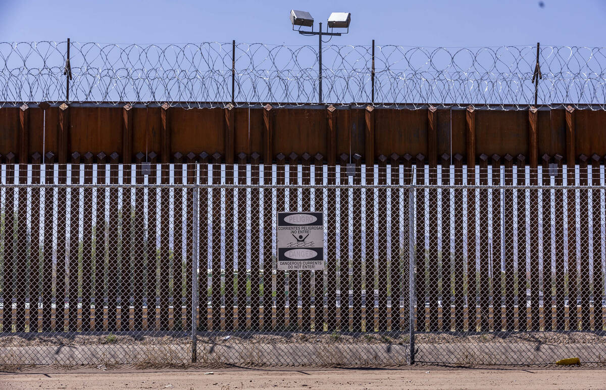 Ciudad Juarez, Mexico, is beyond the border barrier along the Border Highway on Friday, Sept. 1 ...