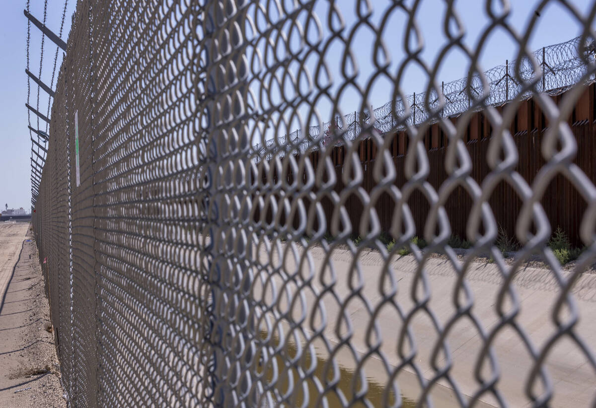 Ciudad Juarez, Mexico, is beyond the border barrier along the Border Highway on Friday, Sept. 1 ...