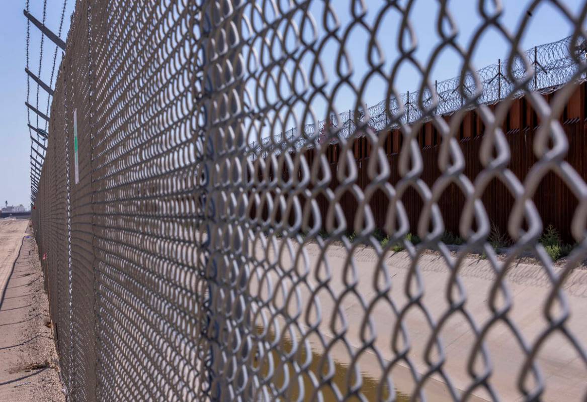 Ciudad Juarez, Mexico, is beyond the border barrier along the Border Highway on Friday, Sept. 1 ...