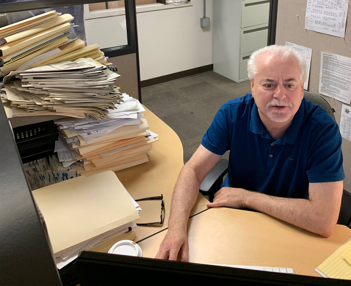 Jeff German working in the Las Vegas Review-Journal offices in 2018. (Photo by Harrison Keely/L ...
