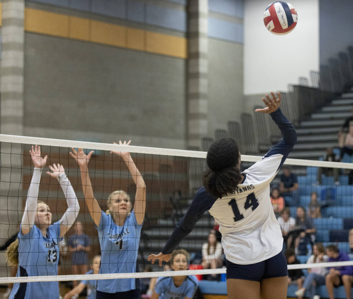 Shadow Ridge's Jyniah Sanders (14) goes up for a hit against Foothill High School on Thursday, ...