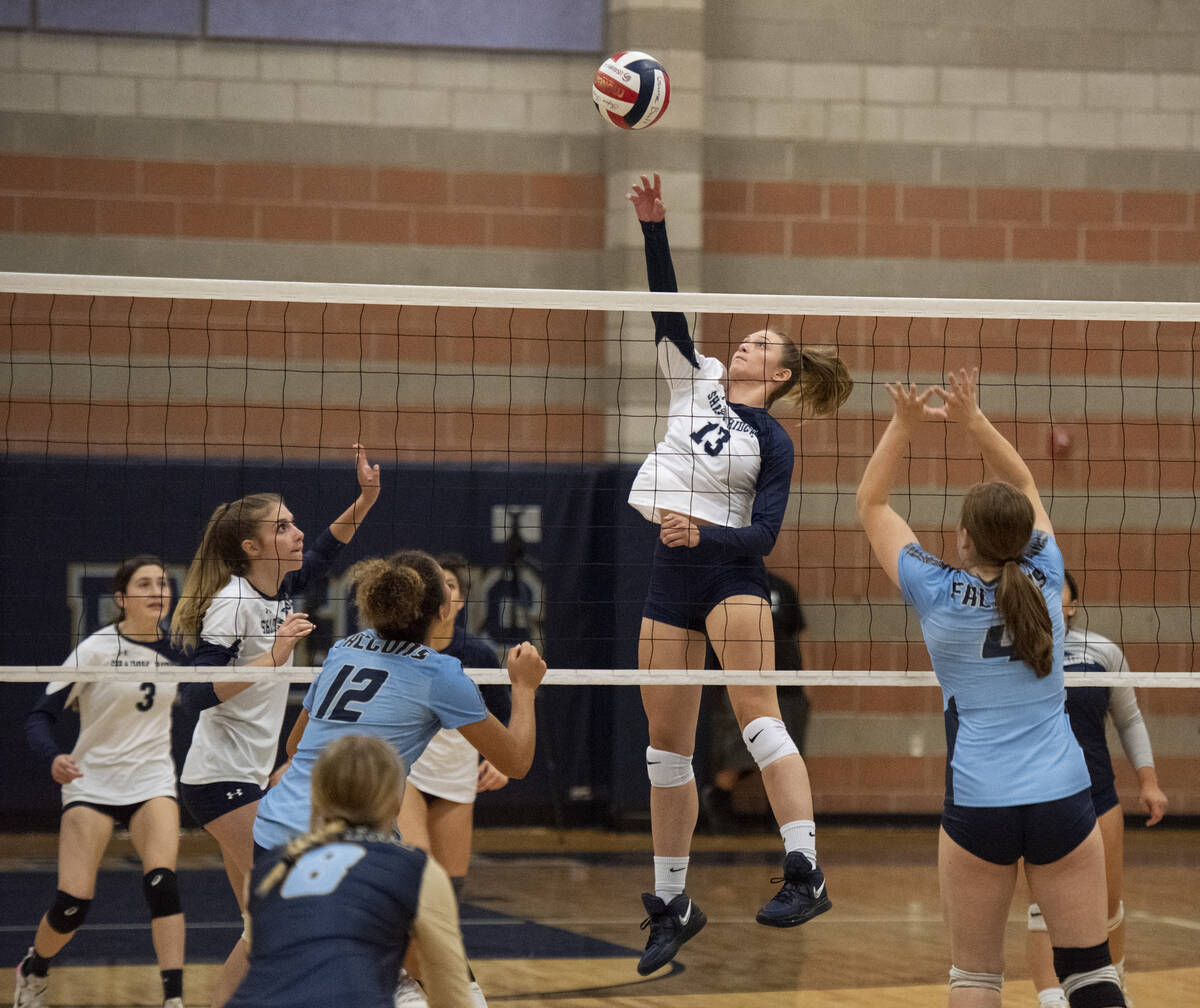 Shadow Ridge's Riah Thurston (13) goes up for a hit at the net against Foothill High School on ...