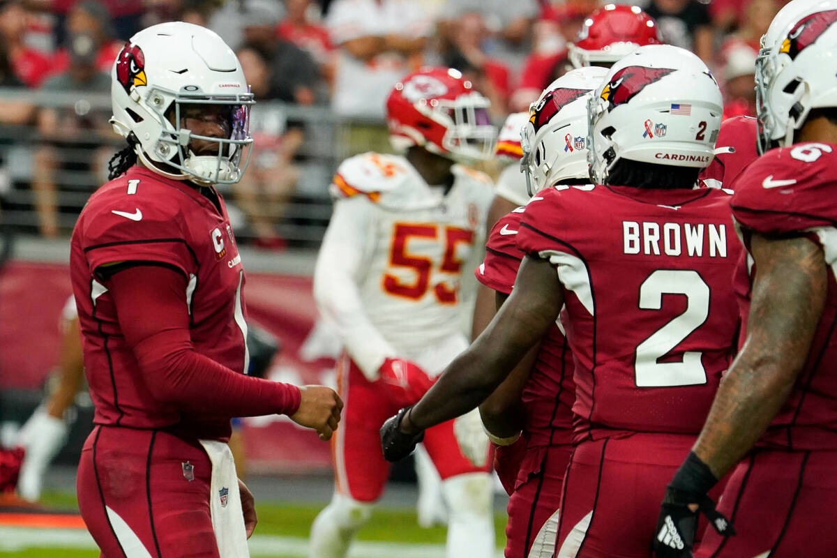 Arizona Cardinals quarterback Kyler Murray (1) congratulates Marquise Brown (2) after his touch ...