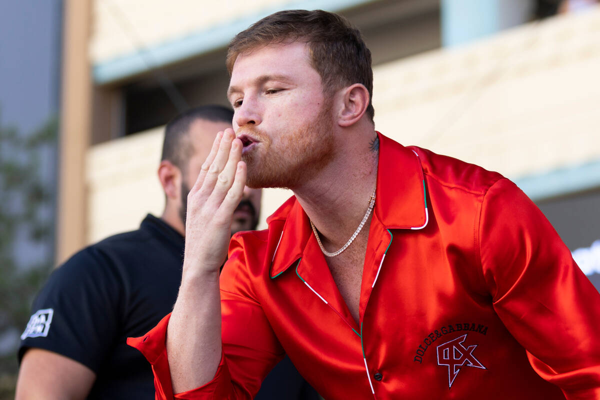 Saul "Canelo" Alvarez gestures to his family during a ceremonial weigh-in at Toshiba ...