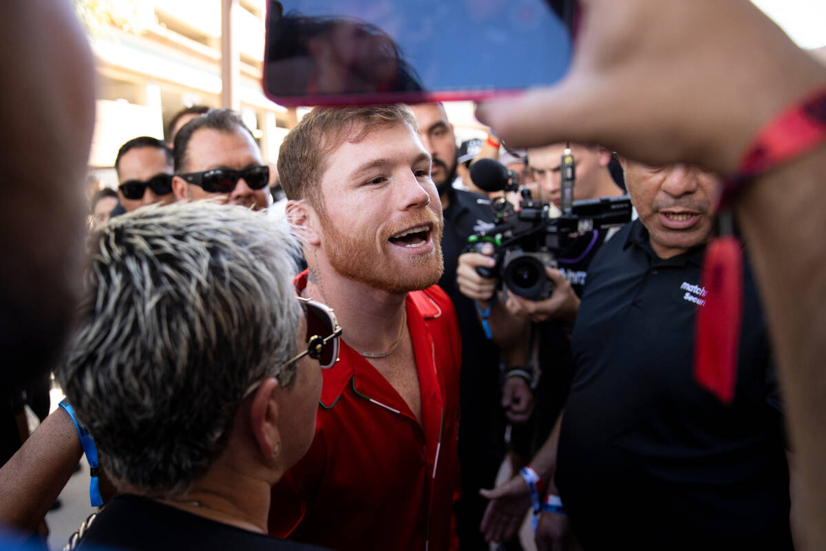 Saul "Canelo" Alvarez, center, greets fans following a ceremonial weigh-in at Toshiba ...